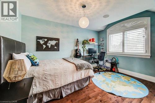 Hardwood flooring & double closet - 124 Allen Street E, Waterloo, ON - Indoor Photo Showing Bedroom
