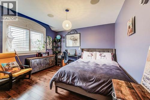 Hardwood flooring & double closet - 124 Allen Street E, Waterloo, ON - Indoor Photo Showing Bedroom