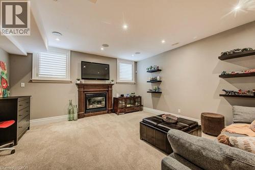 2nd gas fireplace, above grade windows - 124 Allen Street E, Waterloo, ON - Indoor With Fireplace