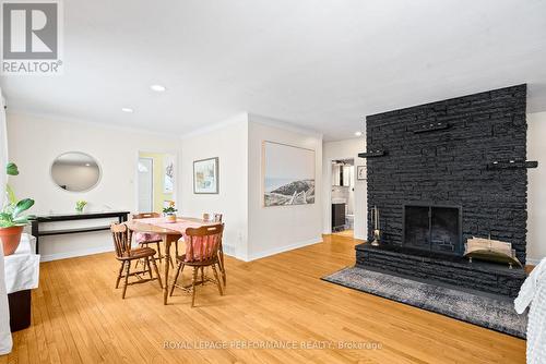Dining space near fireplace - 1430 Edgecliffe Avenue, Ottawa, ON - Indoor Photo Showing Living Room With Fireplace
