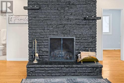 Cozy fireplace to gather around - 1430 Edgecliffe Avenue, Ottawa, ON - Indoor Photo Showing Other Room With Fireplace