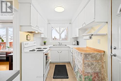 Cozy kitchen with a great view! - 1430 Edgecliffe Avenue, Ottawa, ON - Indoor Photo Showing Kitchen With Double Sink