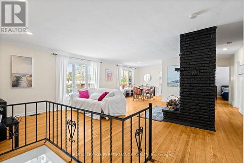 Main level living and dining with a fireplace, too - 1430 Edgecliffe Avenue, Ottawa, ON - Indoor