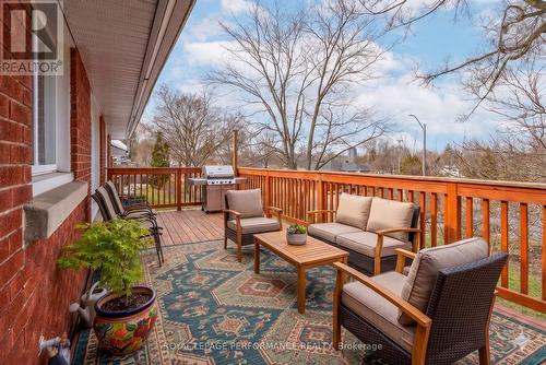 Digitally staged photo of the front deck - 1430 Edgecliffe Avenue, Ottawa, ON - Outdoor With Deck Patio Veranda