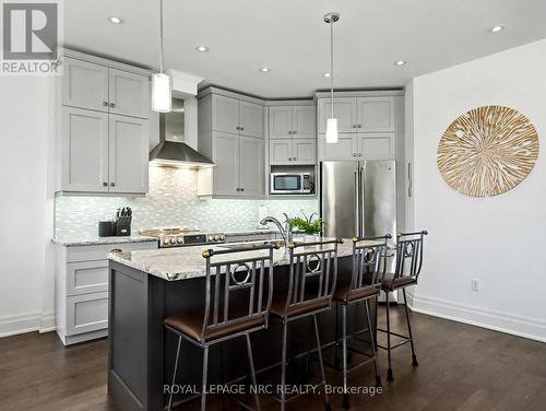 A7 - 7 Aberdeen Lane S, Niagara-On-The-Lake (Town), ON - Indoor Photo Showing Kitchen With Upgraded Kitchen