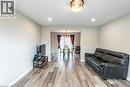 Living room with light wood-style floors and baseboards - 72 Ingleside Drive Unit# Upper, Kitchener, ON  - Indoor 