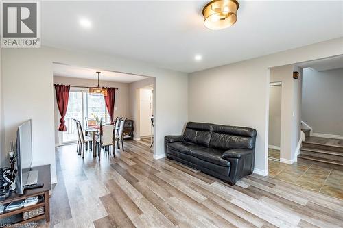 Living area featuring light wood-type flooring and stairway - 72 Ingleside Drive Unit# Upper, Kitchener, ON - Indoor