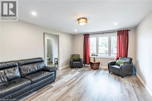 Living room with light wood-style floors and recessed lighting - 72 Ingleside Drive Unit# Upper, Kitchener, ON - Indoor Photo Showing Living Room