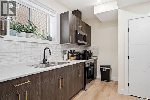 711 Nightingale Road, Saskatoon, SK - Indoor Photo Showing Kitchen With Double Sink