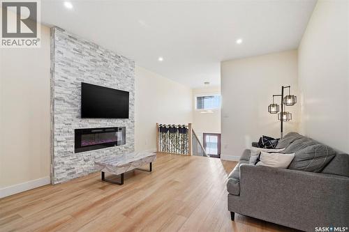 711 Nightingale Road, Saskatoon, SK - Indoor Photo Showing Living Room With Fireplace