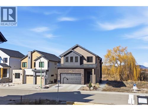 940 Bull Crescent, Kelowna, BC - Outdoor With Facade