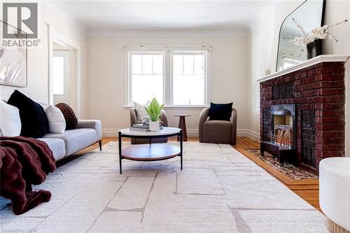 58 Edgemont Street N, Hamilton, ON - Indoor Photo Showing Living Room With Fireplace