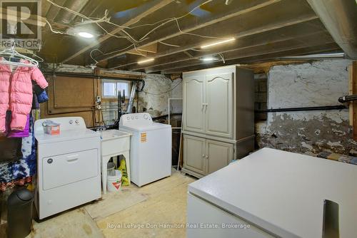 Below Grade Laundry / Storage - 8539 Concession 8, Mapleton, ON - Indoor Photo Showing Laundry Room