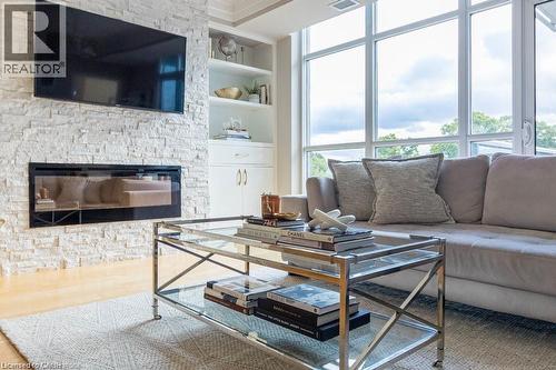 551 Maple Avenue Unit# 607, Burlington, ON - Indoor Photo Showing Living Room With Fireplace