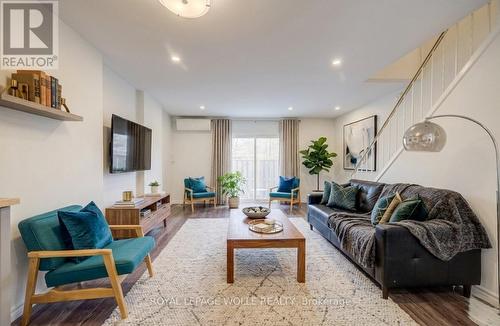 Virtually Staged - 184 Westcourt Place, Waterloo, ON - Indoor Photo Showing Living Room