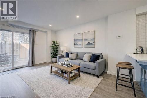 Virtually Staged - 174 Westcourt Place, Waterloo, ON - Indoor Photo Showing Living Room