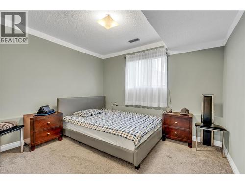 2494 Cornwall Drive, Penticton, BC - Indoor Photo Showing Bedroom