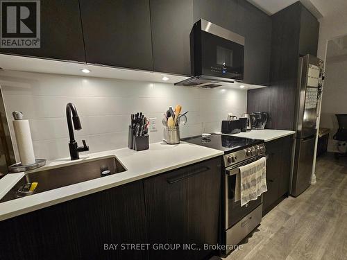 801 - 2369 Danforth Avenue, Toronto, ON - Indoor Photo Showing Kitchen With Upgraded Kitchen