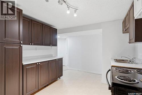 1608 Vickies Avenue, Saskatoon, SK - Indoor Photo Showing Kitchen With Double Sink