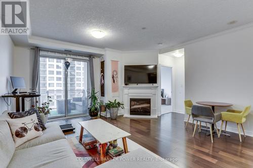 1311 - 330 Ridout Street N, London East (East K), ON - Indoor Photo Showing Living Room With Fireplace
