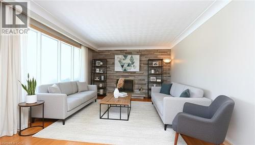 142 Delmar Drive, Hamilton, ON - Indoor Photo Showing Living Room With Fireplace