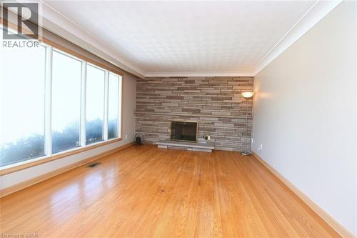 142 Delmar Drive, Hamilton, ON - Indoor Photo Showing Other Room With Fireplace