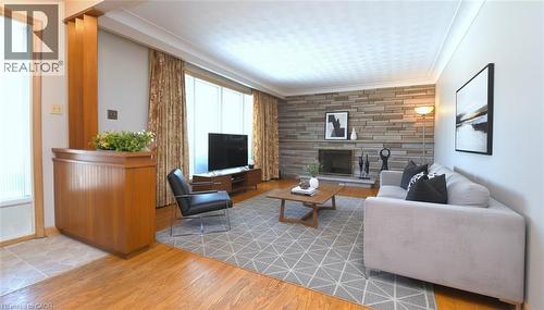 142 Delmar Drive, Hamilton, ON - Indoor Photo Showing Living Room With Fireplace