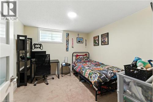 Bedroom featuring light carpet and a textured ceiling - 90 Toby Crescent Unit# Lower, Hamilton, ON - Indoor Photo Showing Bedroom