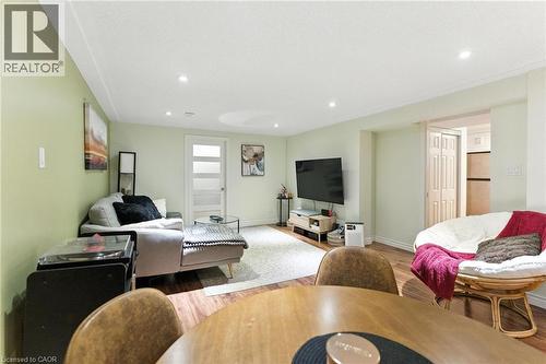 Living area featuring wood finished floors and recessed lighting - 90 Toby Crescent Unit# Lower, Hamilton, ON - Indoor