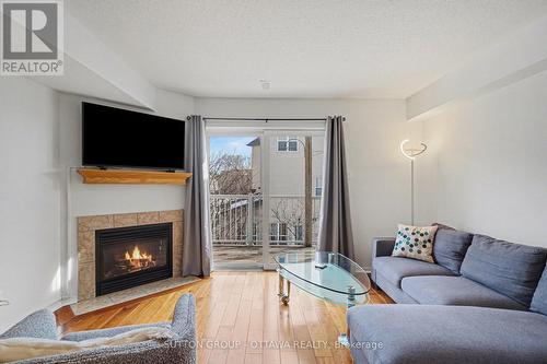 56 Steele Park Private, Ottawa, ON - Indoor Photo Showing Living Room With Fireplace