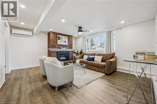 219 Blackhorne Drive, Kitchener, ON - Indoor Photo Showing Living Room With Fireplace