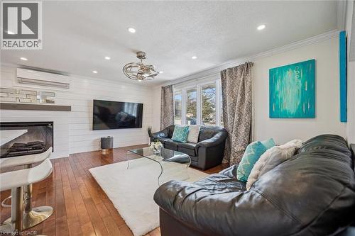 219 Blackhorne Drive, Kitchener, ON - Indoor Photo Showing Living Room With Fireplace
