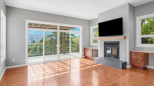 220 West Bench Drive, Penticton, BC - Indoor Photo Showing Living Room With Fireplace