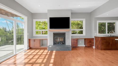 220 West Bench Drive, Penticton, BC - Indoor With Fireplace