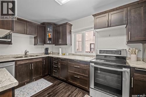 155 24Th Street E, Prince Albert, SK - Indoor Photo Showing Kitchen With Double Sink