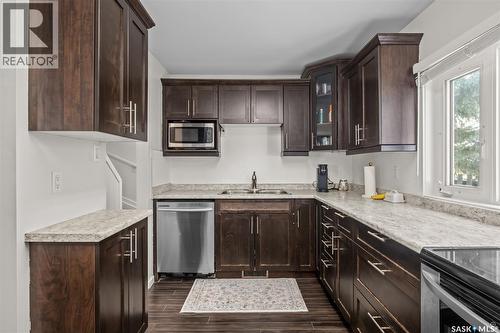 155 24Th Street E, Prince Albert, SK - Indoor Photo Showing Kitchen With Double Sink