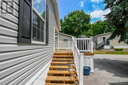The deck railing is all easy clean white vinyl. - 