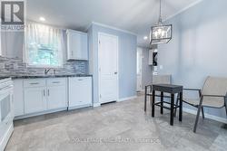Kitchen also has pantry behind the door. - 