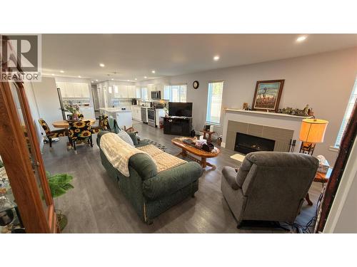594 Sixth Avenue, Midway, BC - Indoor Photo Showing Living Room With Fireplace