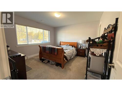 594 Sixth Avenue, Midway, BC - Indoor Photo Showing Bedroom