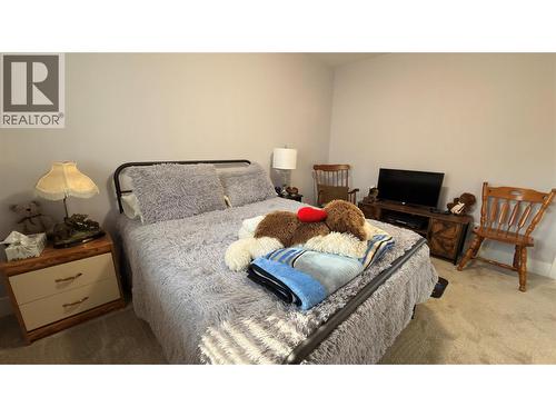 594 Sixth Avenue, Midway, BC - Indoor Photo Showing Bedroom