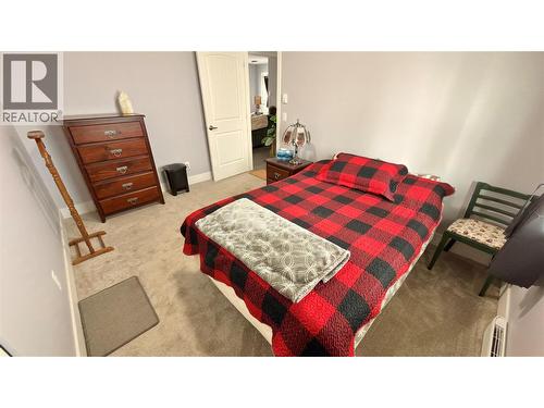 594 Sixth Avenue, Midway, BC - Indoor Photo Showing Bedroom