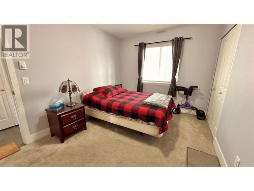 594 Sixth Avenue, Midway, BC - Indoor Photo Showing Bedroom