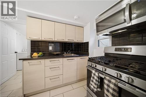Kitchen. 2nd Floor, Ceramic Flooring, Gas Stove, Hard Wired Smoke Detectors - 107 Queen Street S, Hamilton, ON - Indoor Photo Showing Kitchen With Upgraded Kitchen