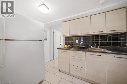 Kitchen. 2nd Floor, Ceramic Flooring, Gas Stove, Hard Wired Smoke Detectors - 107 Queen Street S, Hamilton, ON - Indoor Photo Showing Kitchen