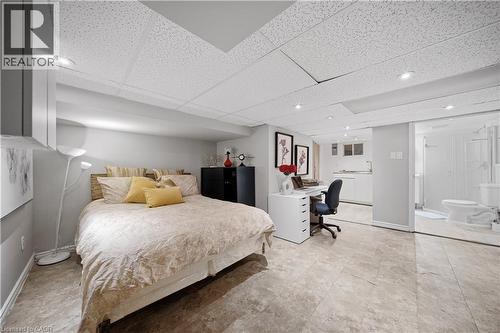 Basement Room, Currently Set Up as Bedroom,/Office, Laundry Located Just Behind - 107 Queen Street S, Hamilton, ON - Indoor Photo Showing Bedroom