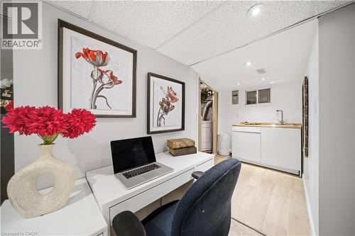 Basement Room, Currently Set Up as Bedroom,/Office, Laundry Located Just Behind - 107 Queen Street S, Hamilton, ON - Indoor Photo Showing Office