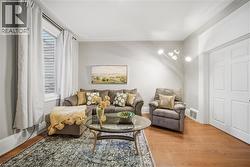 Main Floor Living Room. High Ceilings, Decorative Crown Molding - 