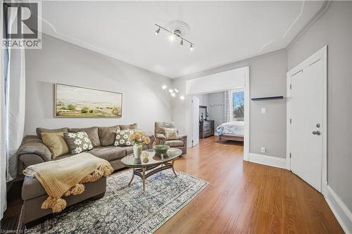 Main Floor Living Room. High Ceilings, Decorative Crown Molding - 107 Queen Street S, Hamilton, ON - Indoor Photo Showing Living Room