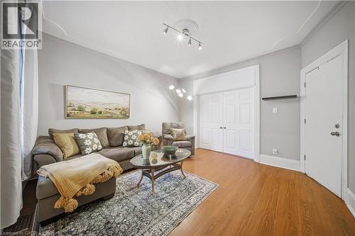 Main floor Living Room. High Ceilings, Decorative Crown Molding - 107 Queen Street S, Hamilton, ON - Indoor Photo Showing Living Room